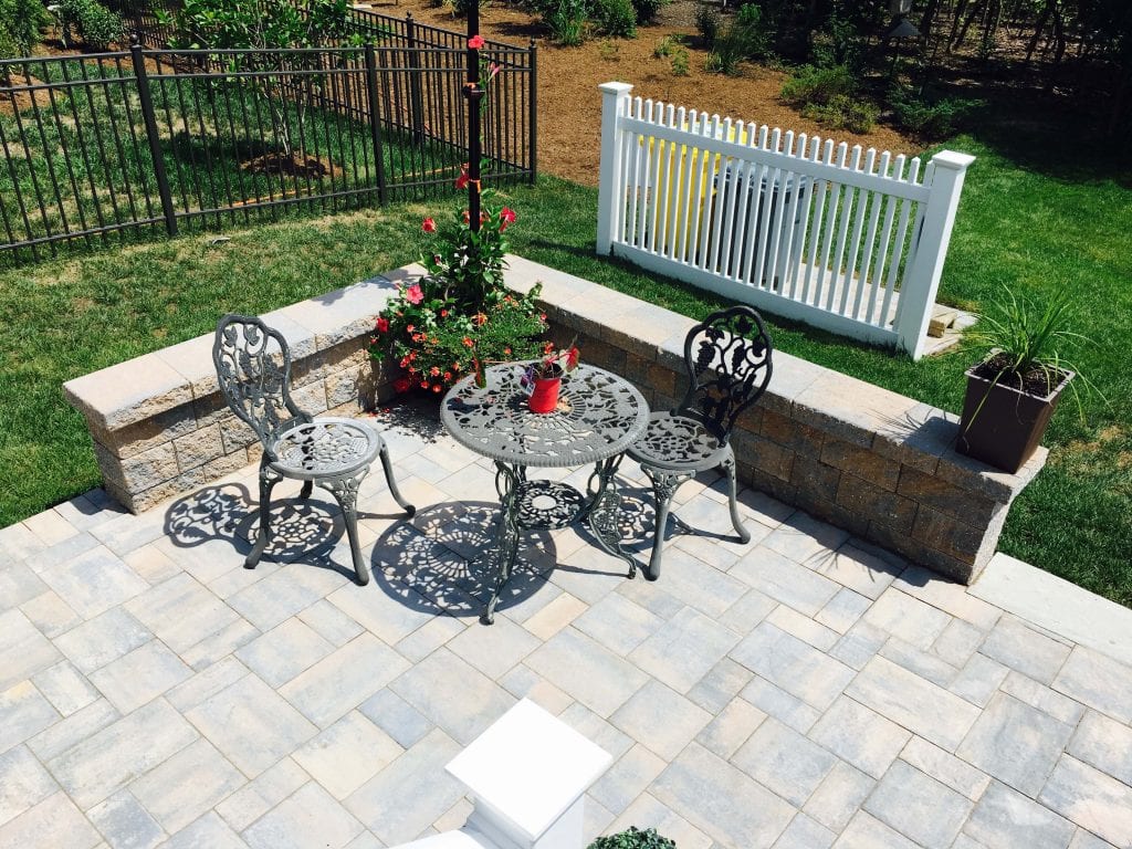 Aerial view of stone patio and wall with table